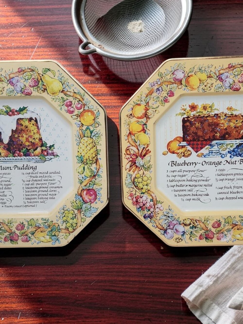 vintage 1982 avon products plum pudding/blueberry orange nut bread tin plates